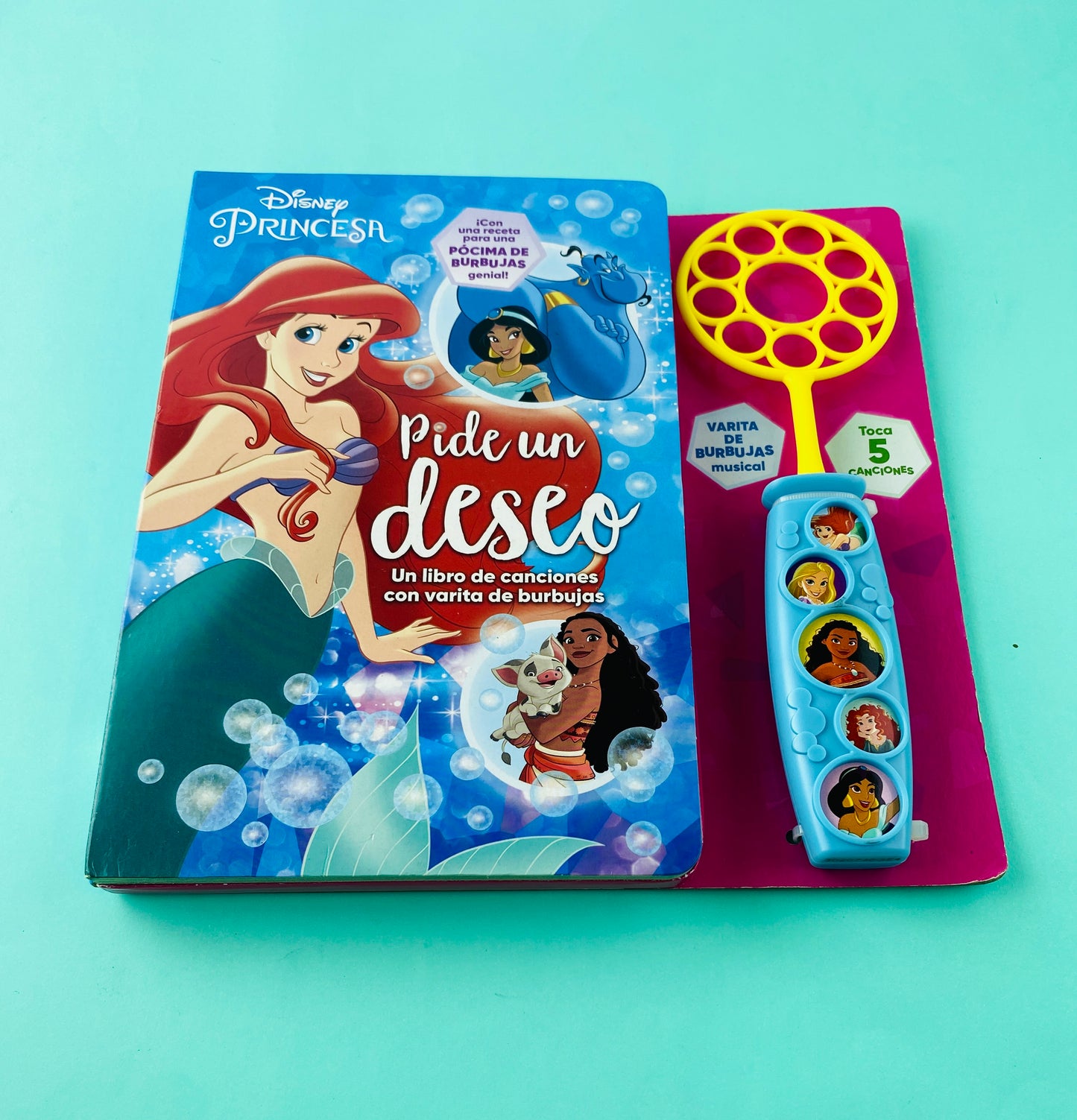 Pide un deseo un libro de canciones con varitas de burbujas