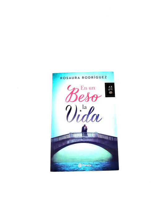 En un beso la vida by Rosaura Rodríguez