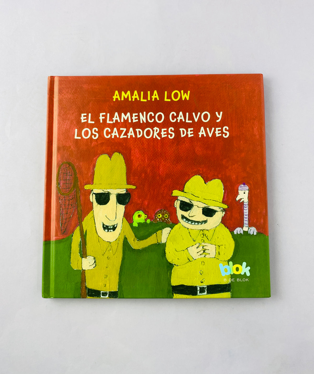 El flamenco calvo y los cazadores de aves by Amalia Low