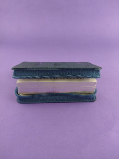 Biblia mini azul canto plateado con cierre
