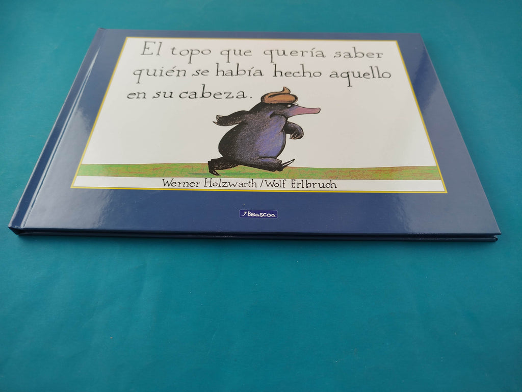 El topo que quería saber quién se había hecho aquello en su cabeza by Werner Holzwarth Y Wolf Erlbruch