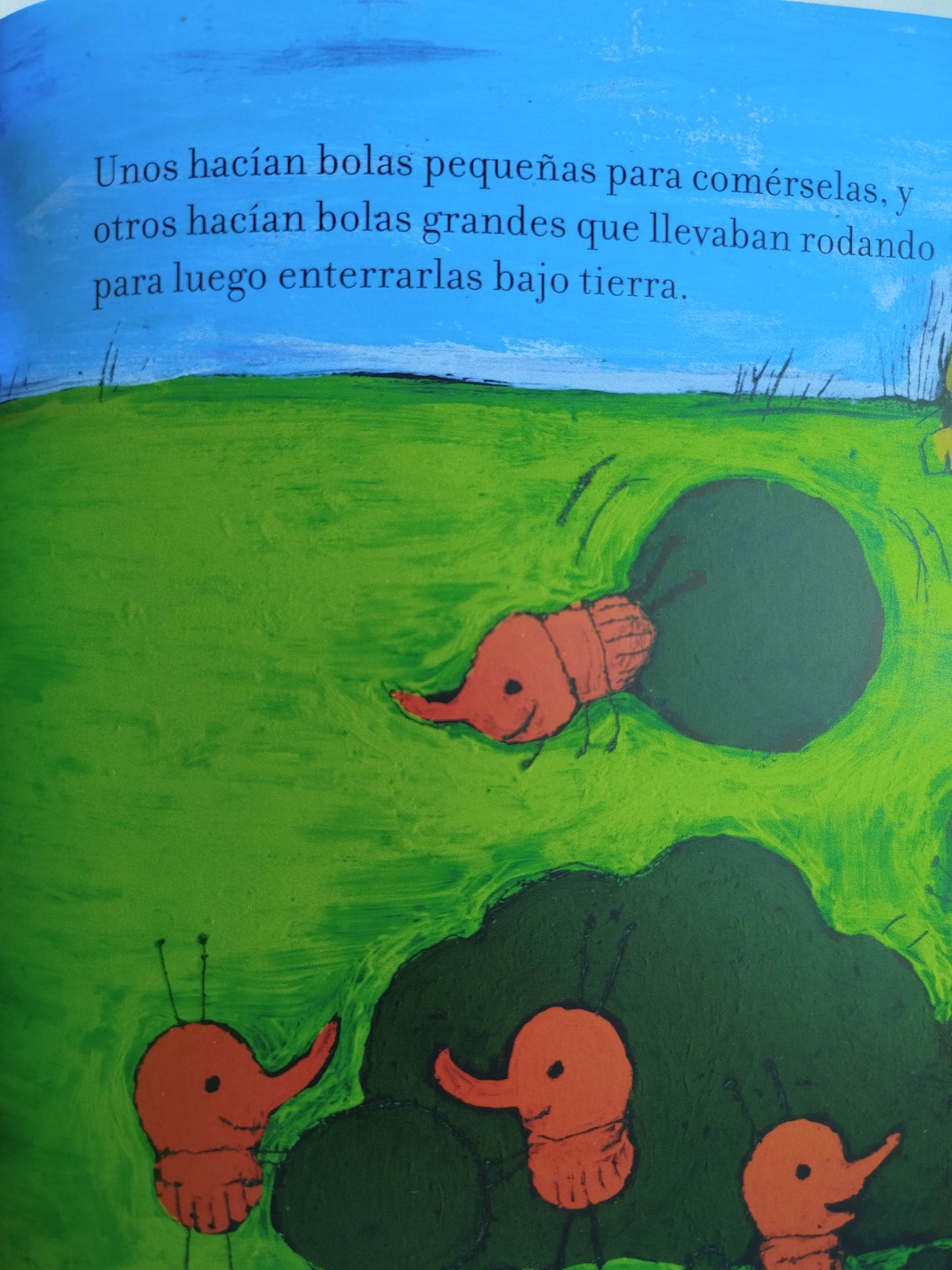 El león y los escarabajos estercoleros by Amalia Low