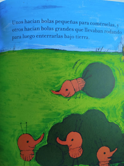 El león y los escarabajos estercoleros by Amalia Low